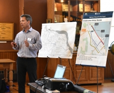 Chris Hiniker of SEH speaks about the 2020 Highway reconstruction project during a luncheon on Thursday, July 25. SEH is the city’s engineering contractor on the project.